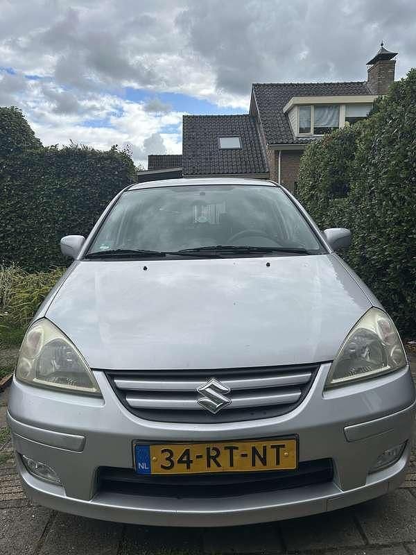 Grijs Gebruikt 2005 Suzuki Liana Exclusive Stationwagen | € 2.200 (Iets duurder) - Afbeelding 1/4