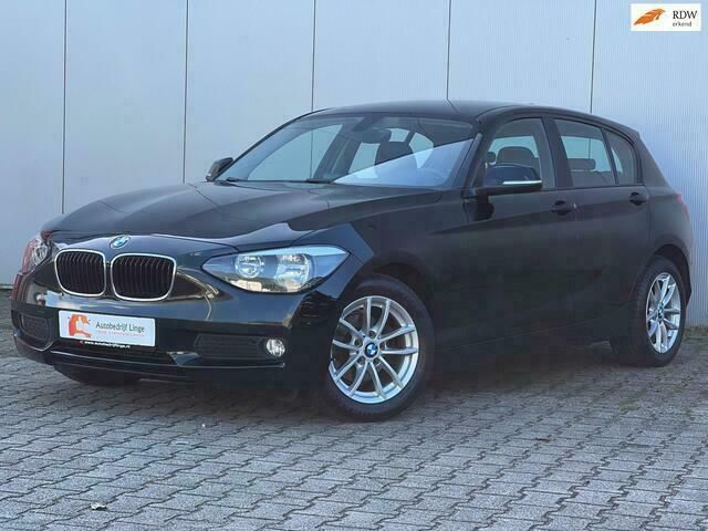 Zwart Gebruikt 2012 BMW 116 Hatchback | € 10.945 (Iets duurder) - Afbeelding 1/4