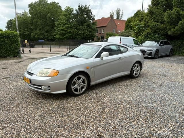 Grijs Gebruikt 2004 Hyundai Coupé Dynamiq Coupé | € 4.795 - Afbeelding 1/4