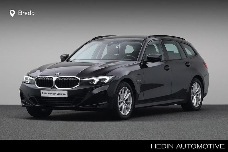 Occasion BMW 330e Executive 184 PK (135 kW) 2022 Zwart Stationwagen