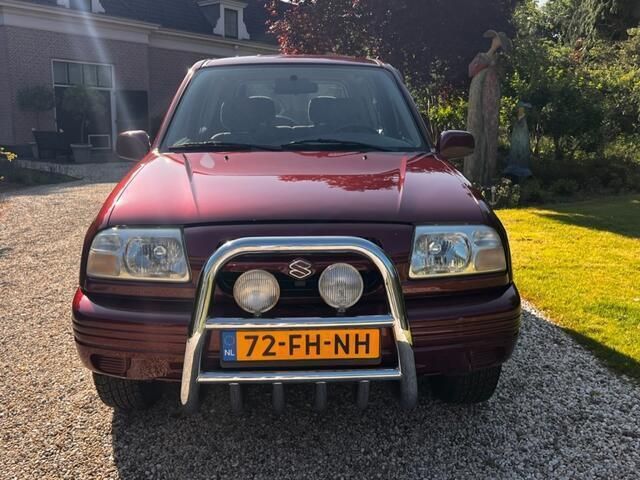 Occasion Suzuki Grand Vitara 132 PK (97 kW) 2000 Rood, metallic lak SUV