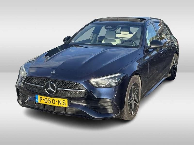Blauw Gebruikt 2022 Mercedes C300e AMG line Stationwagen | € 36.950 (Goede deal) - Afbeelding 1/4
