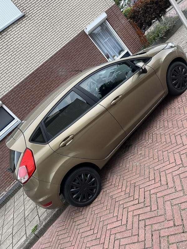 Bruin Gebruikt 2013 Ford Fiesta Style Hatchback | € 5.250 (Goede deal) - Afbeelding 1/4