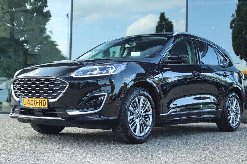 Zwart, metallic lak Gebruikt 2021 Ford Kuga Vignale SUV | € 19.700 (Eerlijke prijs) - Afbeelding 1/4