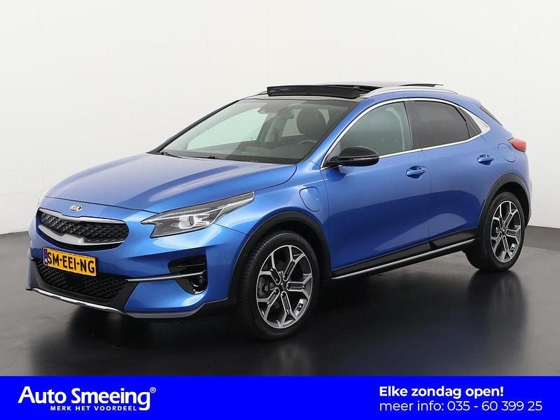 Blue flame metallic (b3l) Gebruikt 2020 Kia XCeed SUV | € 21.895 (Eerlijke prijs) - Afbeelding 1/4