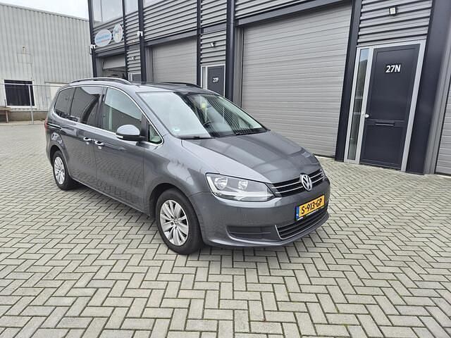 Grijs Gebruikt 2015 VW Sharan Highline MPV | € 15.995 (Eerlijke prijs) - Afbeelding 1/4