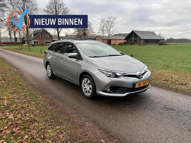 Grijs Gebruikt 2016 Toyota Auris Touring Sports Stationwagen | € 12.450 (Eerlijke prijs) - Afbeelding 1/4