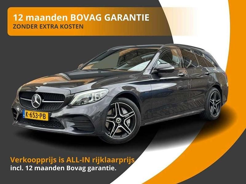 Grijs Gebruikt 2021 Mercedes C300e Business Stationwagen | € 24.850 (Goede deal) - Afbeelding 1/3