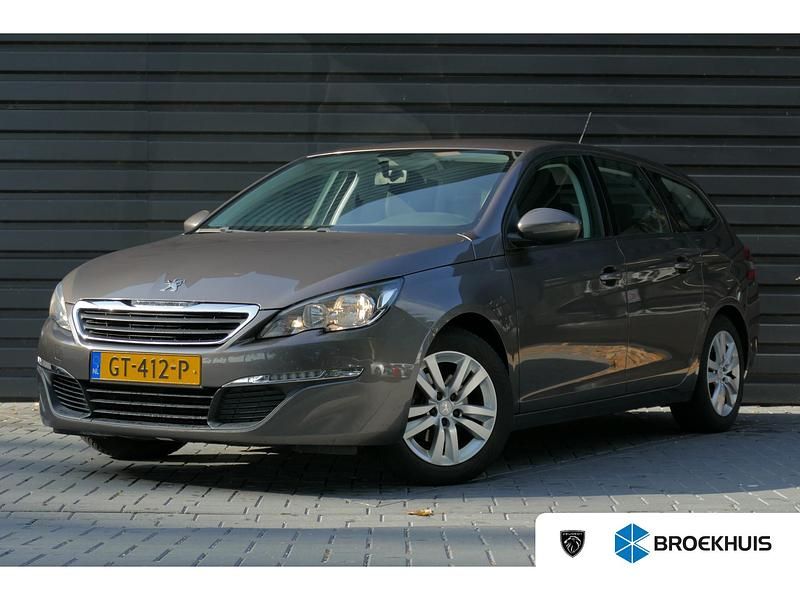 Grijs Gebruikt 2015 Peugeot 308 Stationwagen | € 7.895 (Eerlijke prijs) - Afbeelding 1/4