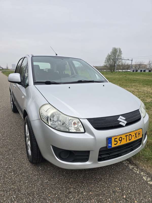 Grijs Gebruikt 2006 Suzuki SX4 Comfort Hatchback | € 3.149 (Duur) - Afbeelding 1/4