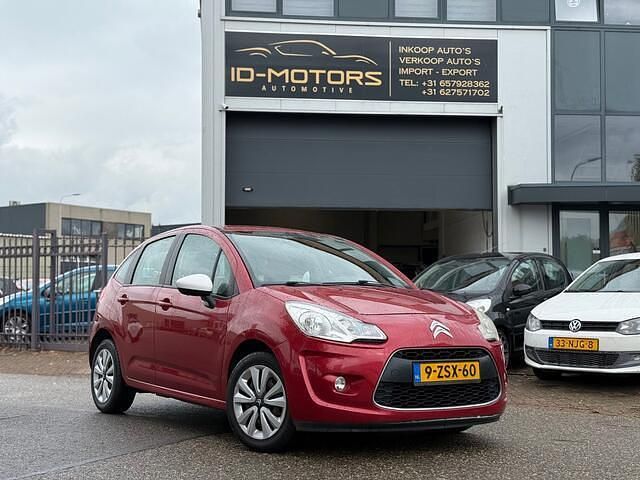 Rood Occasion 2012 Citroën C3 Attraction Hatchback | € 3.299 (Goede deal) - Afbeelding 1/4