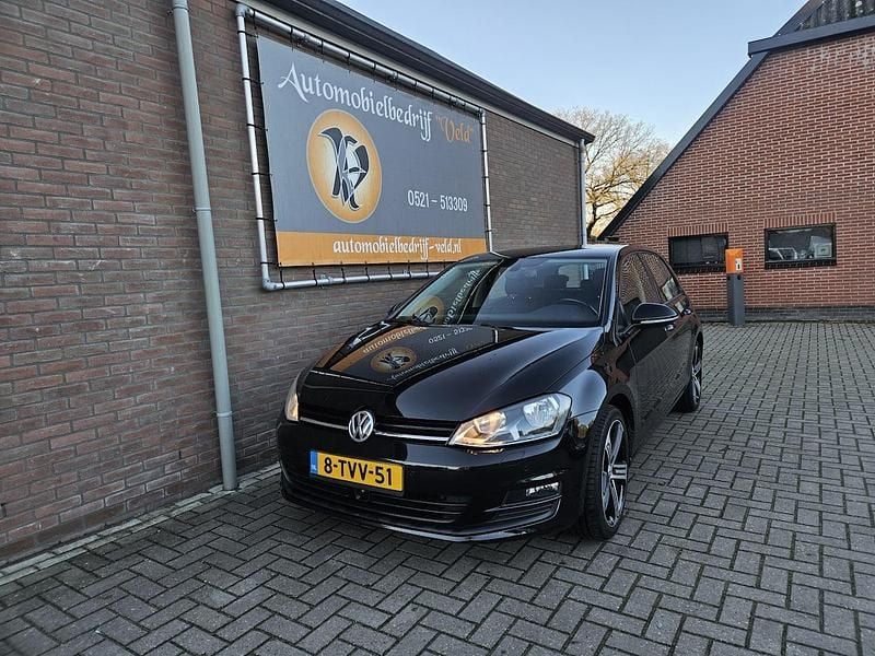 Zwart Gebruikt 2013 VW Golf VII Highline Hatchback | € 9.445 (Super prijs) - Afbeelding 1/4
