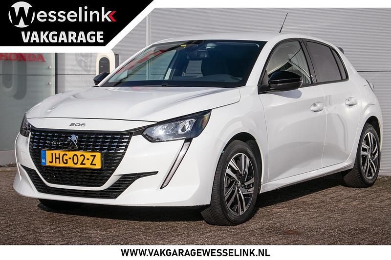 Wit (metallic) Occasion 2024 Peugeot 208 Allure Hatchback | € 21.750 (Eerlijke prijs) - Afbeelding 1/4