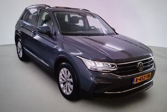 Grijs (metallic) Gebruikt 2021 VW Tiguan Business SUV | € 25.745 (Super prijs) - Afbeelding 1/4