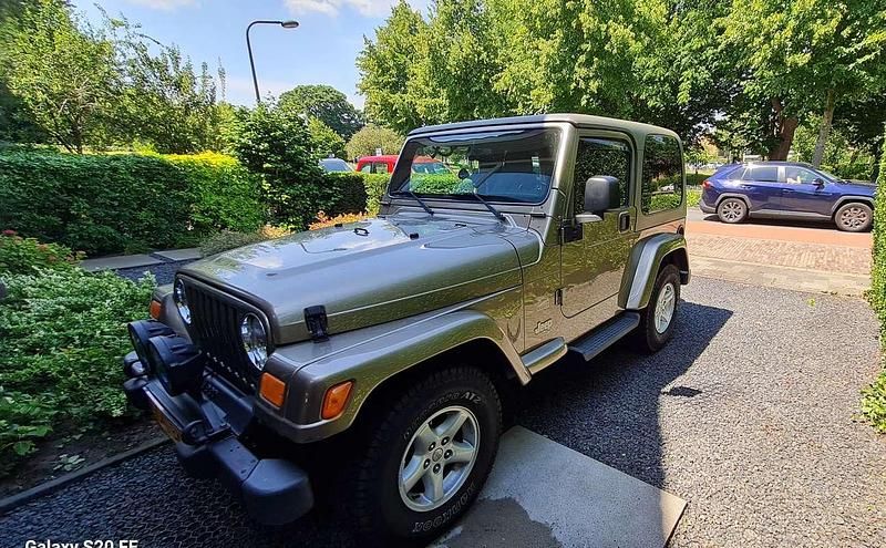 Occasion Jeep Wrangler Sahara 177 PK (130 kW) 2004 Brons SUV
