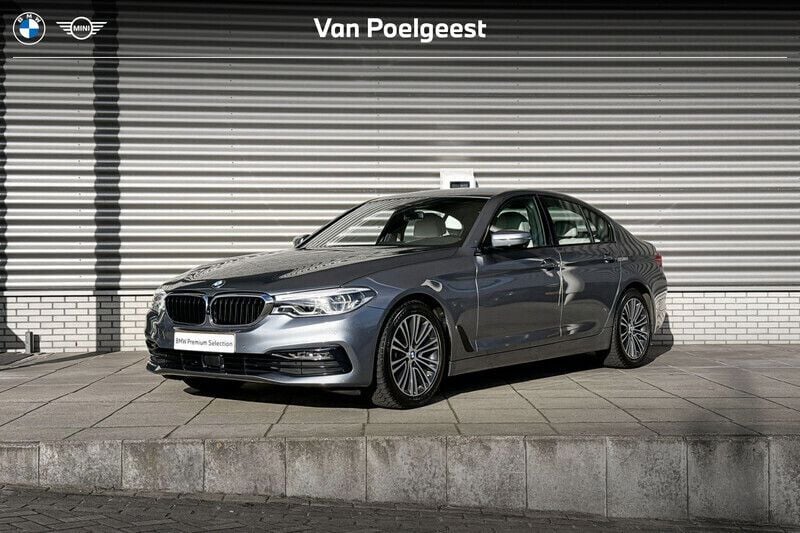 Bluestone metallic (grijs metallic) Gebruikt 2019 BMW 520 Executive Sedan | € 29.900 (Goede deal) - Afbeelding 1/4