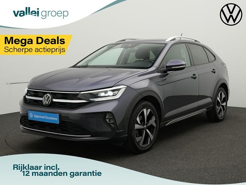 Grijs Gebruikt 2024 VW Taigo Style SUV | € 24.600 (Eerlijke prijs) - Afbeelding 1/4