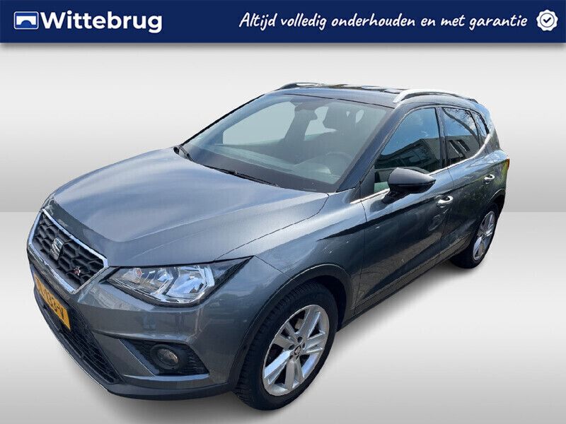 Grijs, metallic lak Gebruikt 2018 Seat Arona FR SUV | € 17.450 (Eerlijke prijs) - Afbeelding 1/2