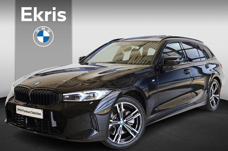 Zwart Gebruikt 2024 BMW 330e M Sport Stationwagen | € 49.900 (Goede deal) - Afbeelding 1/4