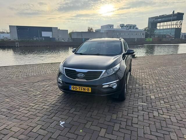 Zwart Gebruikt 2012 Kia Sportage Plus SUV | € 6.450 (Goede deal) - Afbeelding 1/4