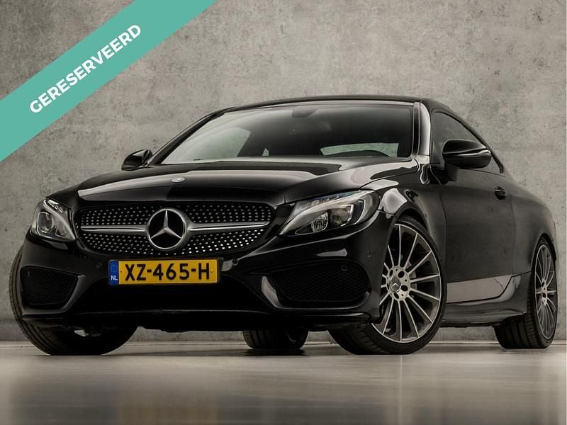 Zwart Occasion 2016 Mercedes C180 AMG Coupé | € 22.445 - Afbeelding 1/4