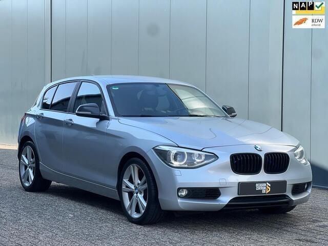 Grijs Gebruikt 2012 BMW 118 Hatchback | € 5.950 (Eerlijke prijs) - Afbeelding 1/4