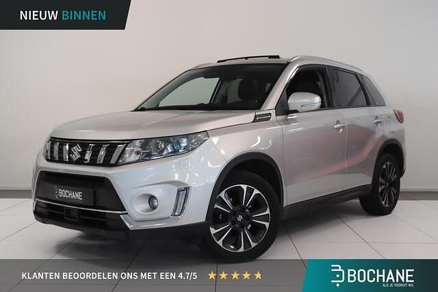 Grijs (metallic) Gebruikt 2019 Suzuki Vitara SUV | € 14.740 (Goede deal) - Afbeelding 1/4