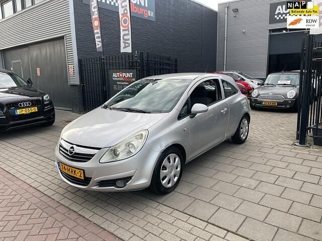 Grijs Occasion 2009 Opel Corsa Enjoy Hatchback | € 1.499 (Super prijs) - Afbeelding 1/4