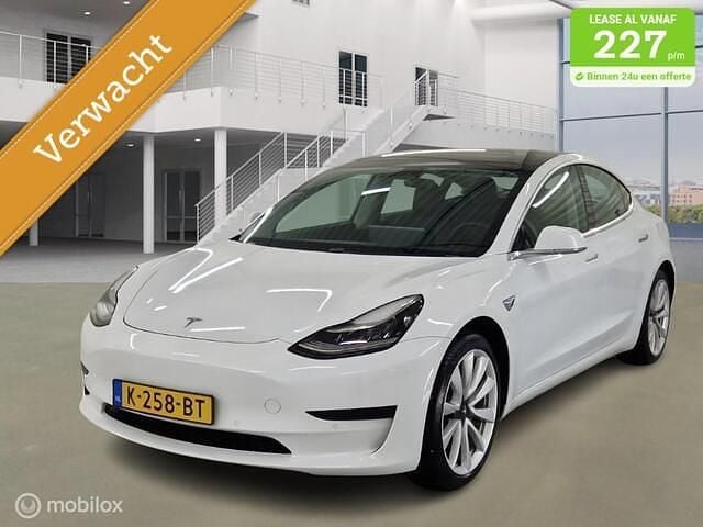 Wit (parellak) Gebruikt 2020 Tesla Model 3 Standard Range Sedan | € 16.995 (Goede deal) - Afbeelding 1/4