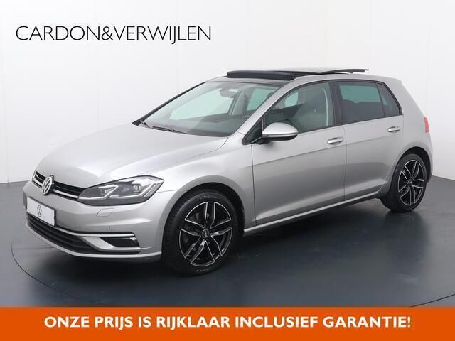 Grijs Gebruikt 2018 VW Golf VII Highline Hatchback | € 18.940 (Eerlijke prijs) - Afbeelding 1/4