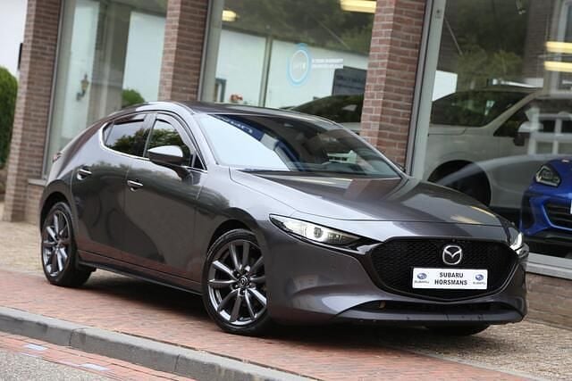 Grijs Gebruikt 2021 Mazda 3 Luxury Hatchback | € 19.950 (Goede deal) - Afbeelding 1/4