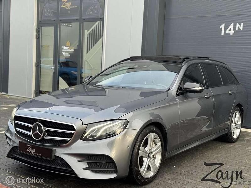 Grijs Occasion 2017 Mercedes E350 Premium Plus Stationwagen | € 23.950 (Eerlijke prijs) - Afbeelding 1/4