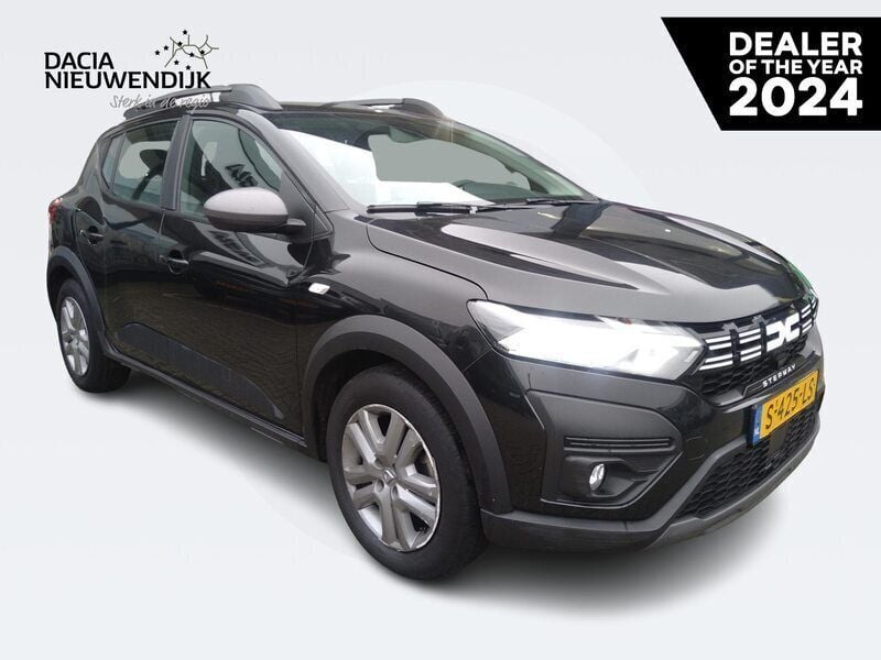 Noir nacre 676 Gebruikt 2023 Dacia Sandero Expression Hatchback | € 17.930 (Eerlijke prijs) - Afbeelding 1/4