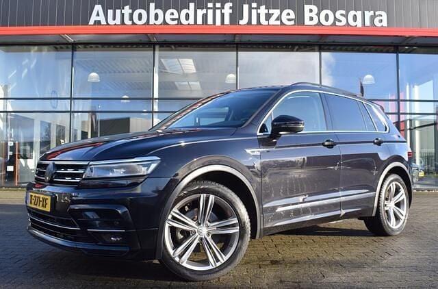 Zwart (metallic) Occasion 2019 VW Tiguan Highline SUV | € 25.950 (Goede deal) - Afbeelding 1/4