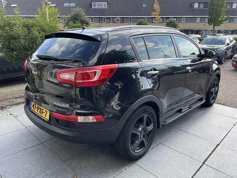 Zwart Occasion 2011 Kia Sportage Plus SUV | € 8.750 (Goede deal) - Afbeelding 1/4