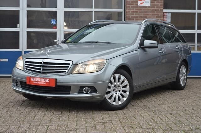 Grijs (metallic) Gebruikt 2009 Mercedes C220 Elegance Stationwagen | € 4.450 (Eerlijke prijs) - Afbeelding 1/4