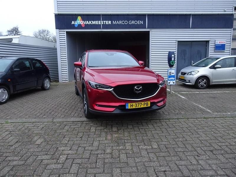 Rood (metallic) Gebruikt 2020 Mazda CX-5 Signature SUV | € 31.750 (Eerlijke prijs) - Afbeelding 1/4