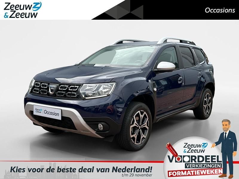 Navyblauw d42 Gebruikt 2021 Dacia Duster Prestige SUV | € 17.240 (Goede deal) - Afbeelding 1/4