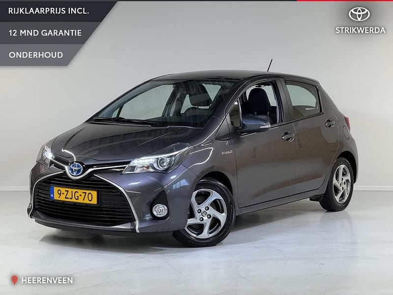 Grijs Gebruikt 2015 Toyota Yaris Hybrid Hatchback | € 13.745 (Eerlijke prijs) - Afbeelding 1/4