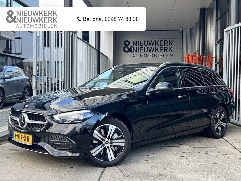 Zwart, metallic lak Gebruikt 2023 Mercedes C300 Luxury Stationwagen | € 41.899 (Super prijs) - Afbeelding 1/4