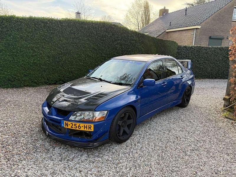 Blauw Gebruikt 2004 Mitsubishi Lancer Sedan | € 30.000 - Afbeelding 1/4