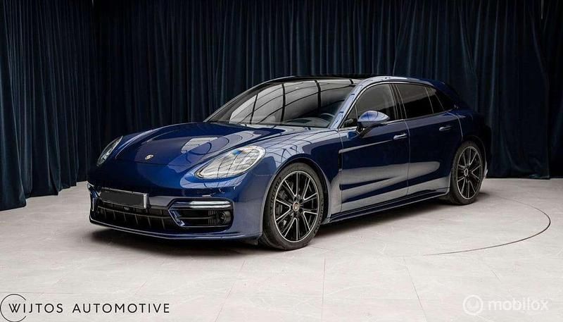 Blauw Occasion 2023 Porsche Panamera Platinum Edition Stationwagen | € 84.950 (Goede deal) - Afbeelding 1/4