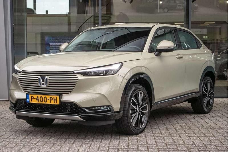 Bruin, metallic lak Gebruikt 2022 Honda HR-V Advance SUV | € 29.900 (Eerlijke prijs) - Afbeelding 1/4