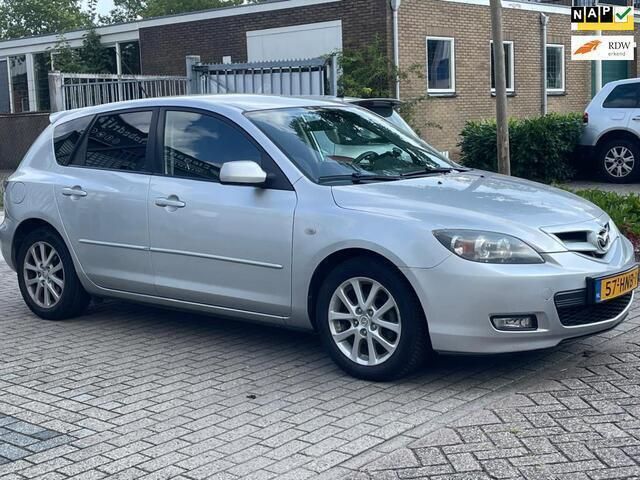 Grijs Gebruikt 2009 Mazda 3 Active Hatchback | € 3.990 (Goede deal) - Afbeelding 1/4
