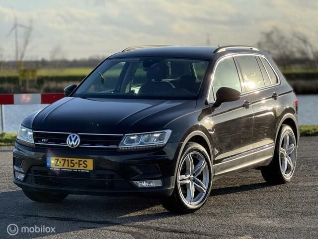 Zwart Gebruikt 2017 VW Tiguan Comfortline SUV | € 16.950 (Goede deal) - Afbeelding 1/4