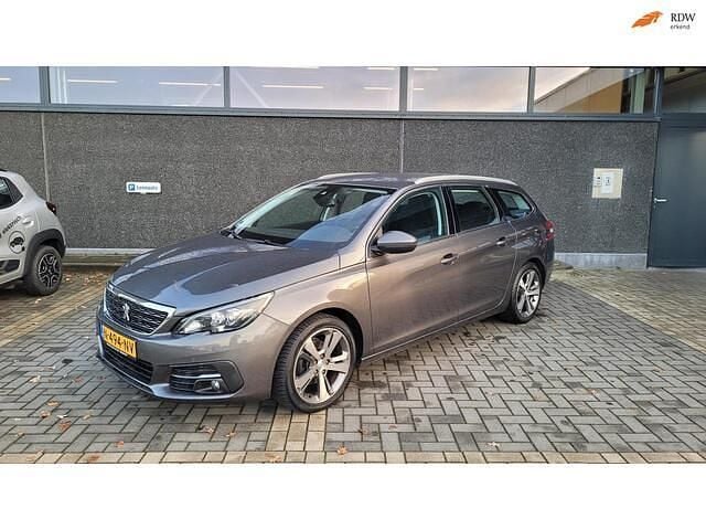 Grijs (metallic) Gebruikt 2017 Peugeot 308 SW Allure Stationwagen | € 12.250 (Iets duurder) - Afbeelding 1/4