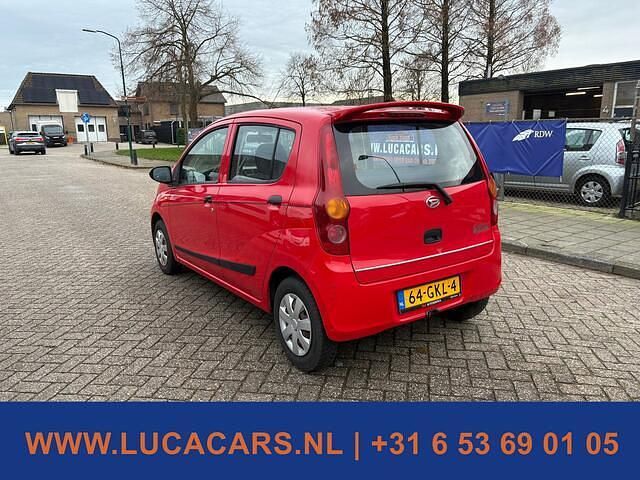 Occasion Daihatsu Cuore 69 PK (50 kW) 2008 Rood Hatchback