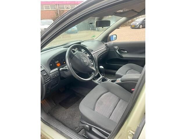 Occasion Renault Laguna III Business 135 PK (99 kW) 2007 Geel Hatchback