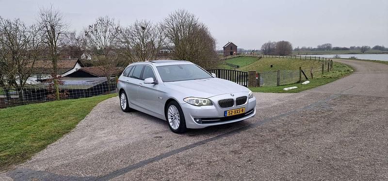Occasion BMW 520 Executive 184 PK (135 kW) 2012 Zilver Stationwagen