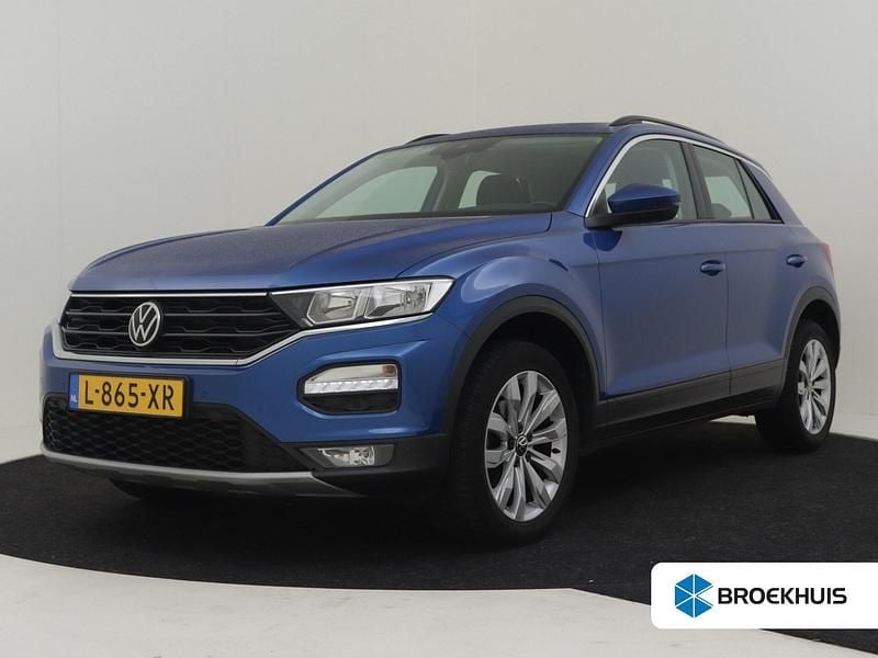 Blauw, metallic lak Gebruikt 2021 VW T-Roc Style SUV | € 25.900 (Goede deal) - Afbeelding 1/4
